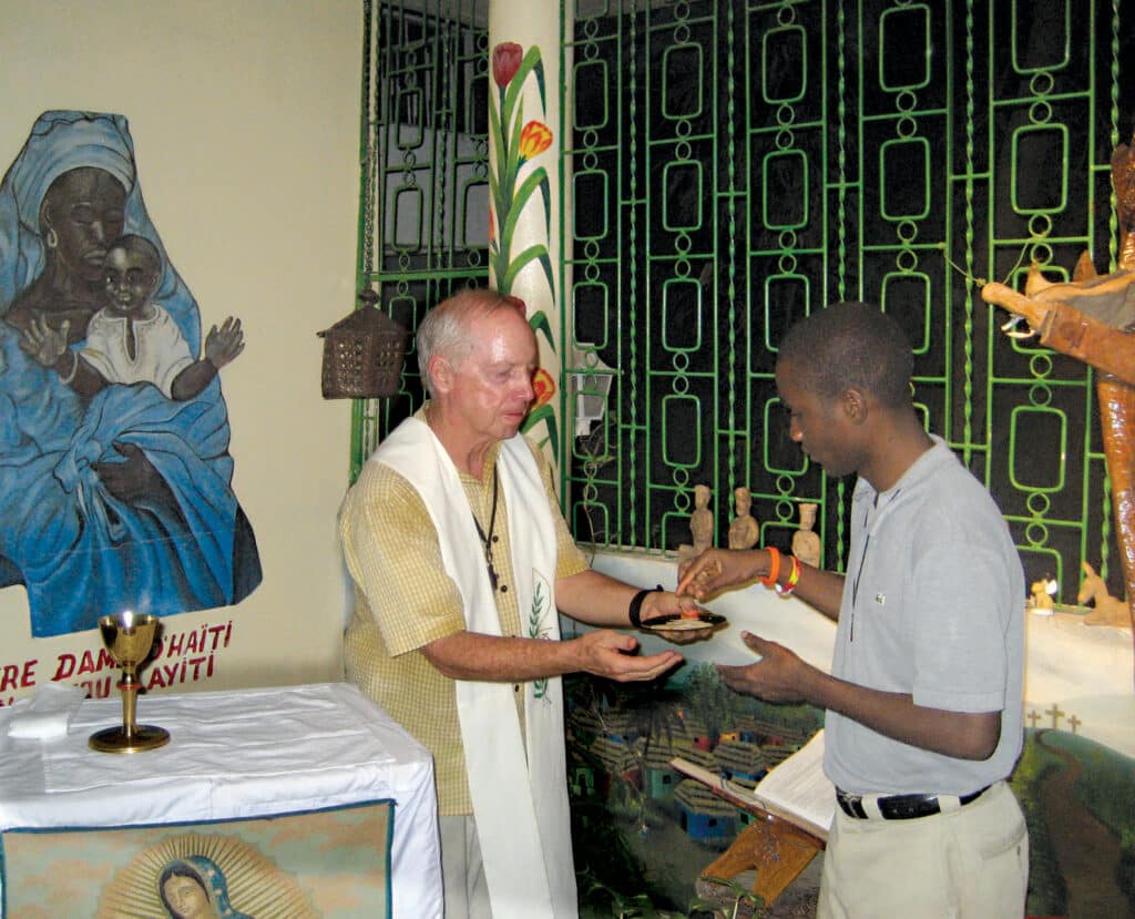 Father Tom Hagan with parishioner