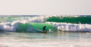 Australian surfers on a wave