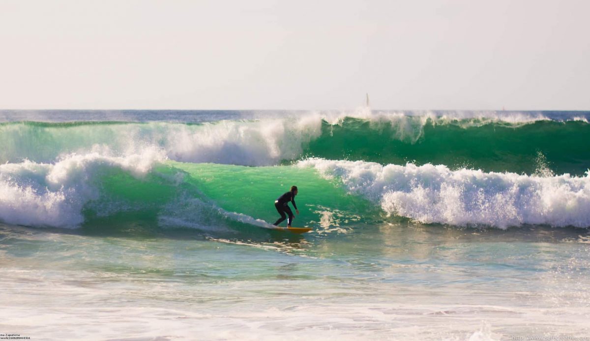 Australian surfers on a wave