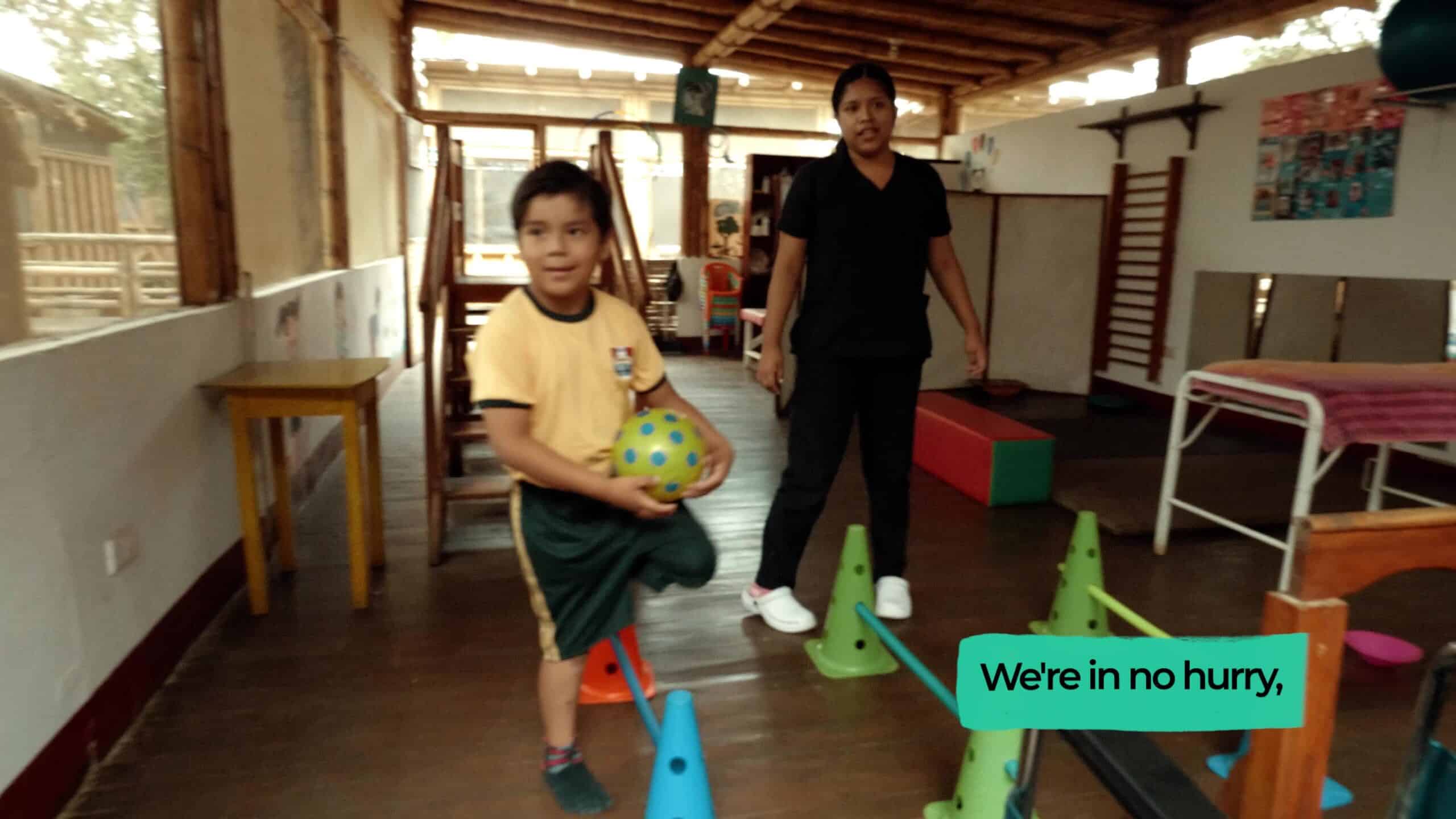 A child taking part in a movement activity at an inclusive school in Máncora
