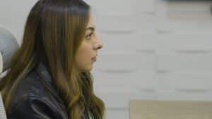 Doménica Cobo listening during a mental health support meeting in Ecuador